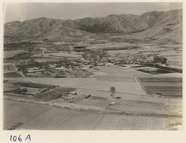 Fields and mountains seen from the hillock of the Hei long tan