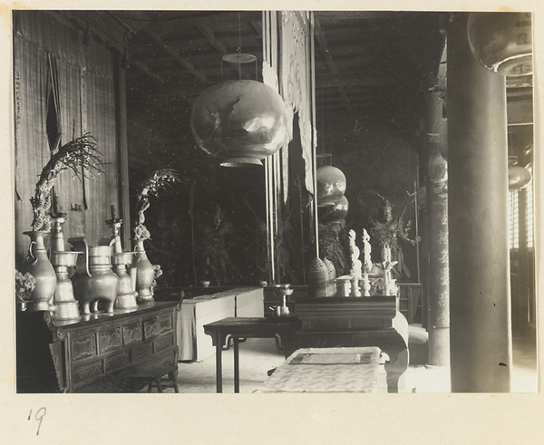 Altar with ritual objects and inscribed column at Xi yu si