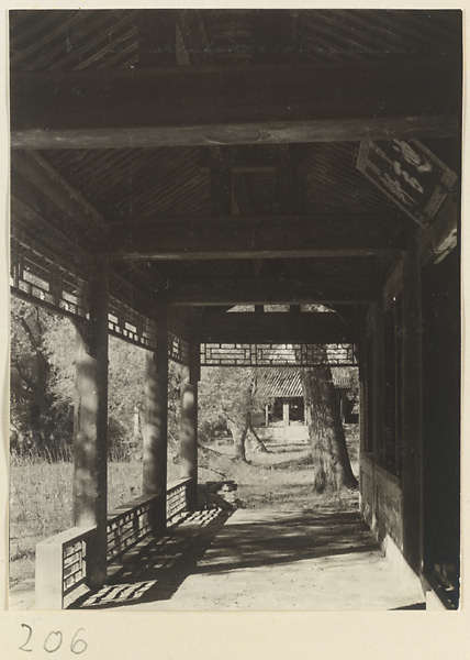 Interior view of columnaded porch with signboard at the Old Wu Garden