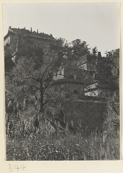 Buildings and stupa-style pagodas below Zhi hui hai on Back Hill at Yihe Yuan