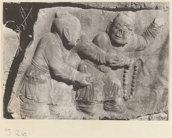 Relief figures with rosary cut into the hillside at Yuquan Hill