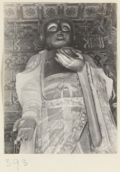 Temple interior showing giant statue of Buddha at Wan shou si