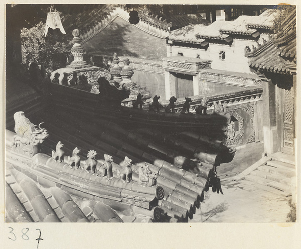 Building details showing roof ornaments and ornamental windows at Wan shou si