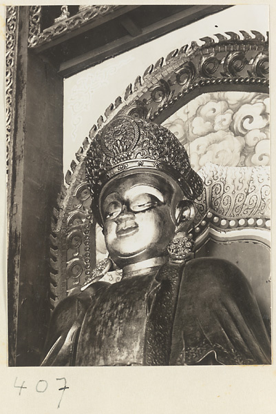 Detail of a statue of a Bodhisattva showing head and crown at Wan shou si
