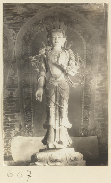 Temple interior showing a statue of a Bodhisattva at Huang si