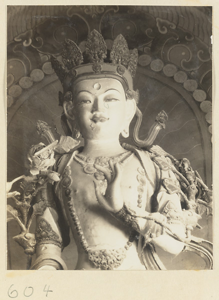 Detail of a statue of a Bodhisattva at Huang si