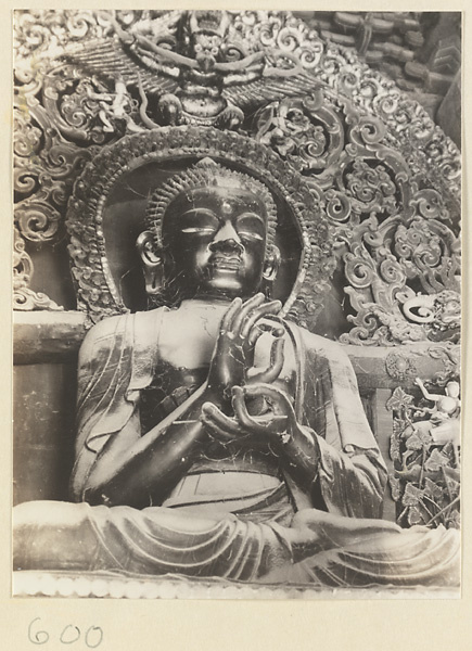Temple interior showing Buddha statue at Huang si