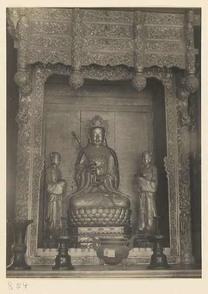 Interior of Wan shan dian showing left section of main altar with statues of Bodhisattva and attendants