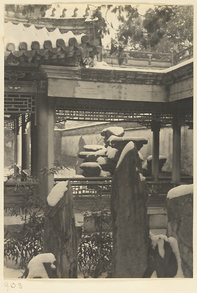 Rock garden next to a covered walkway at Nanhai Gong Yuan