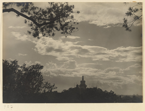 Silhouette of Bai ta against the sky