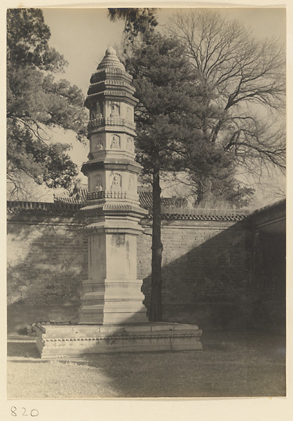 Storied stone pagoda in courtyard at Beihai Gong Yuan