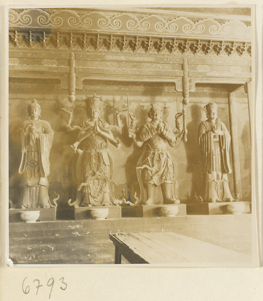 Interior view of Da jue si showing four shrine figures, two with multiple arms