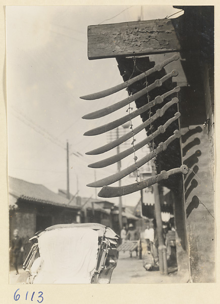 Shop sign for a sword and knife shop