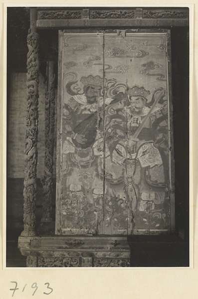 Interior of a temple building at Jie tai si showing a painting of two of the four celestial kings