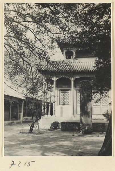 Stone stela in front of a temple building at Jie tai si