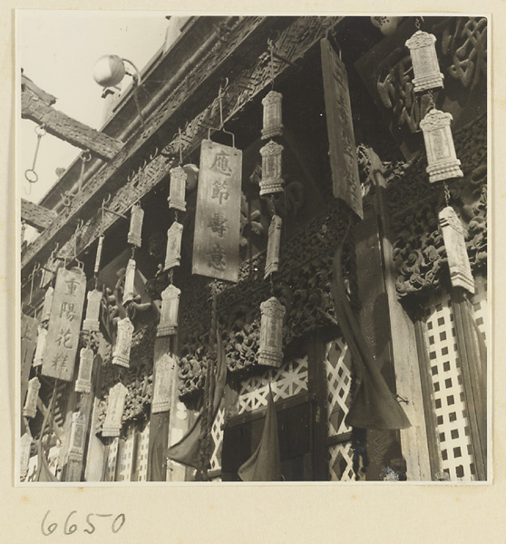 Facade of a pastry shop showing shop signs