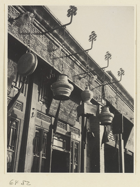 Facade of a wine shop showing shop signs