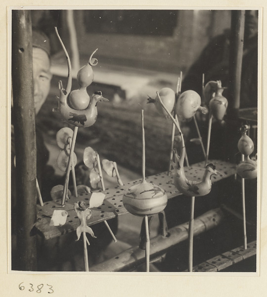 Display of blown candy forms on vendor's stand