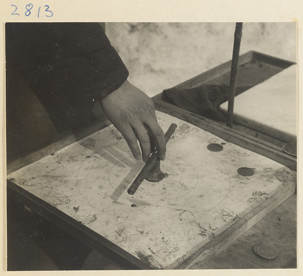 Tracery candy customer spinning a dial to choose a candy form