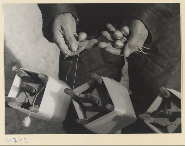 Silk spinner with his tools