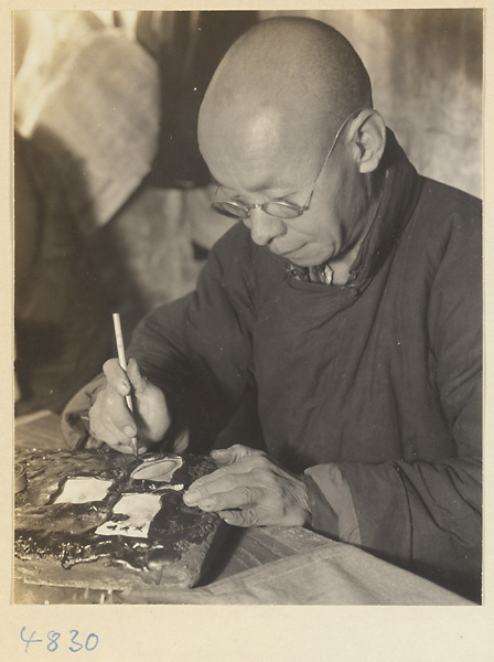 Silversmith at work in a workshop