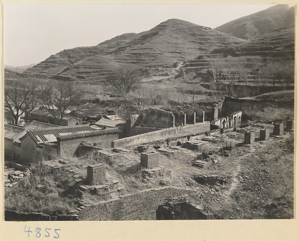 Tile and brick factory near Mentougou Qu with terraced hills in background