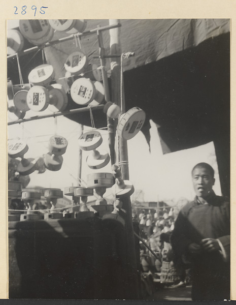 Street vendor selling diabolo tops at New Year's