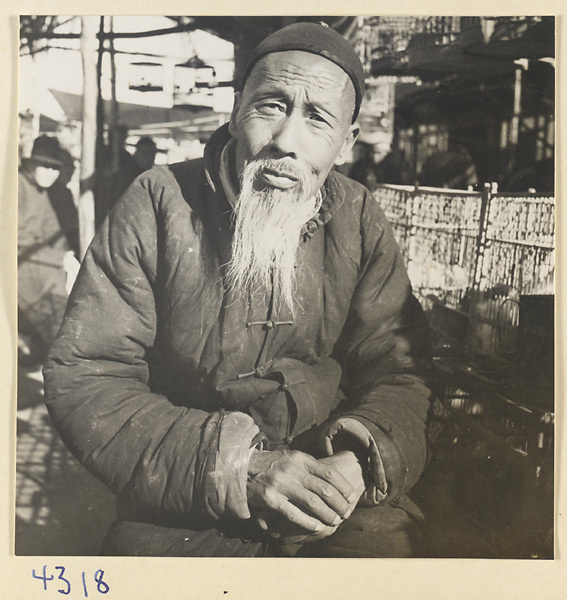 Man at a bird market