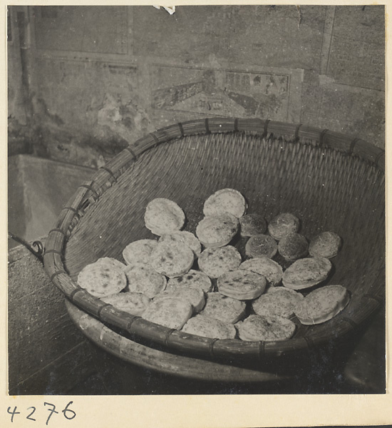 Kitchen interior showing a basket of ma bing