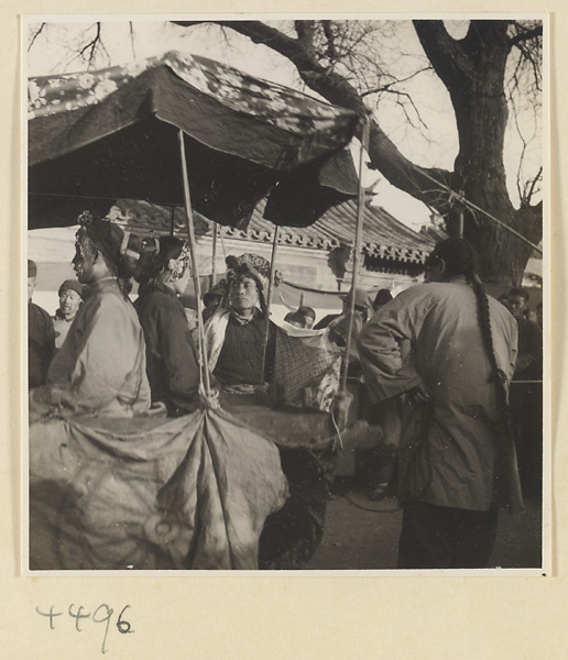 Street entertainers in costume at Tianqiao Market