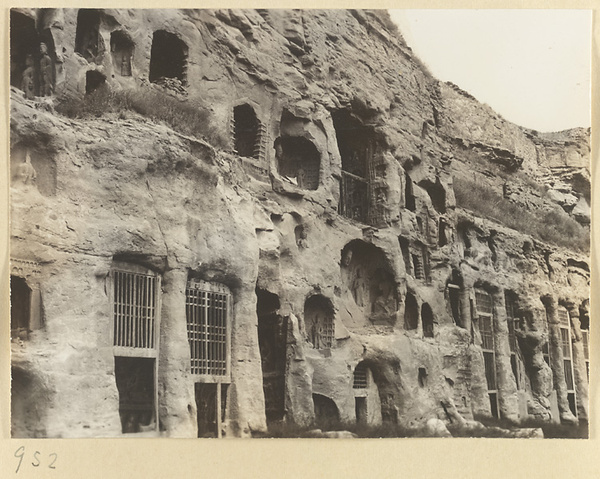 Detail of Wuzhou Cliff at Yun'gang showing the entrances of Caves 9-12