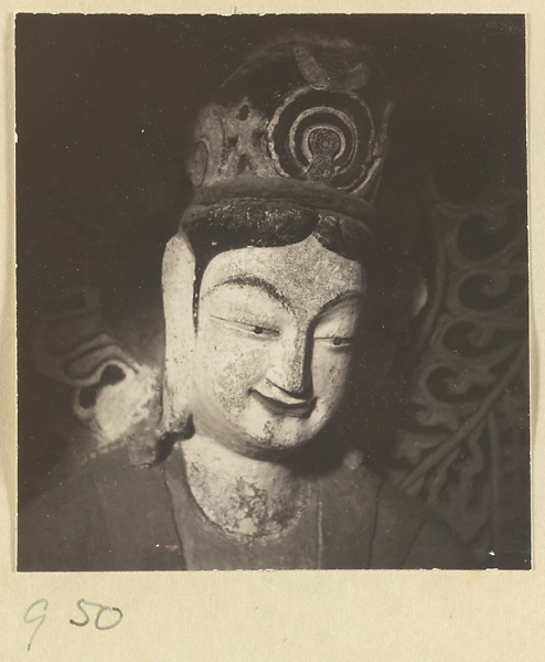 Detail showing the head of a statue of a Bodhisattva at the Yun'gang Caves