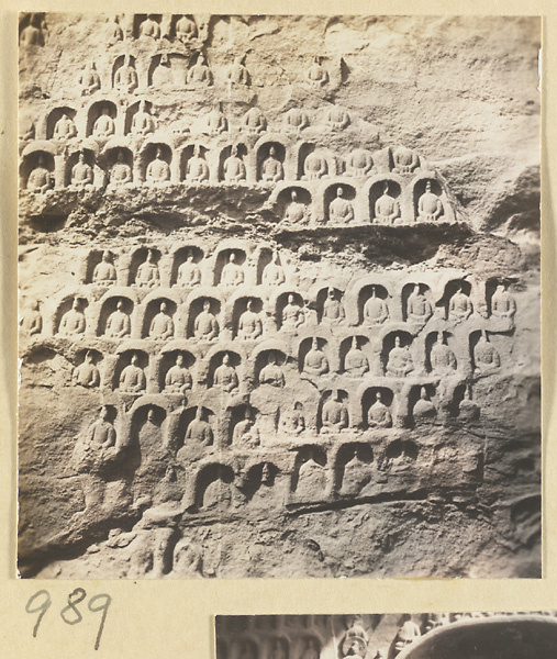 Interior detail of a cave temple at Yun'gang showing a wall with Buddha niches