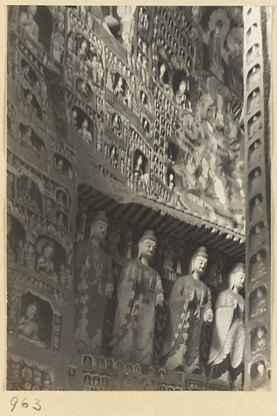 Interior view of a cave temple at Yun'gang showing niches with Buddhist reliefs