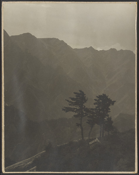 Daoist temple building on West Peak of Hua Mountain with Qinling Mountains in background