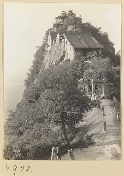 Trail, inscribed stone arch, and Daoist monastery on North Peak Ridge of Hua Mountain