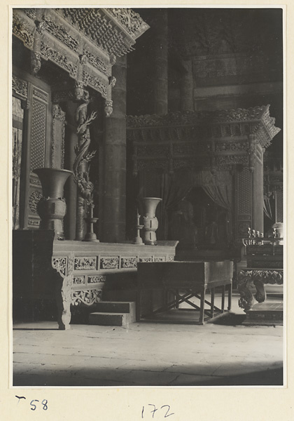 Interior of Da cheng dian showing altar of Confucius (left) and eastern shrine of disciples (right)