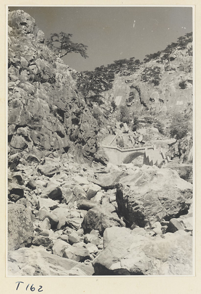 Trail up Tai Mountain showing bridge and stone steps