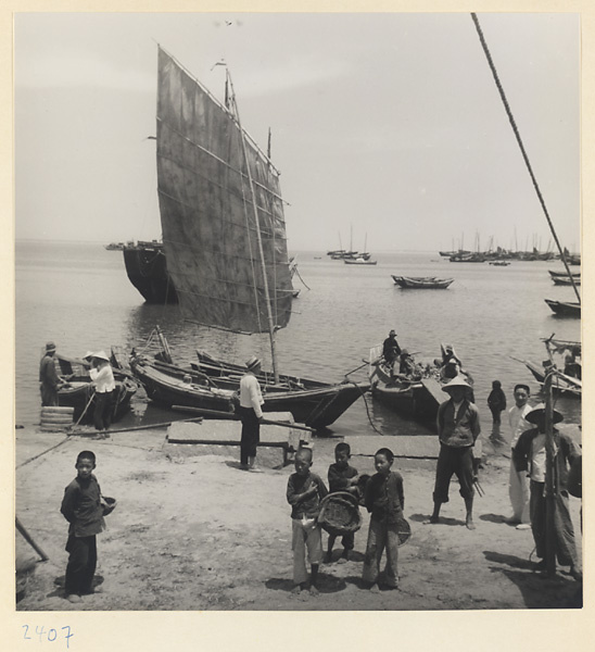 Junks and villagers on the Shandong coastline