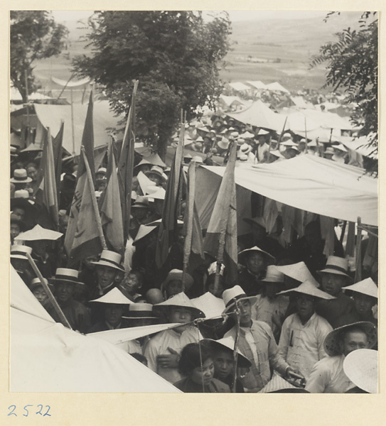 Market fair with flags during the Dragon Boat Festival in a village on the Shandong coast