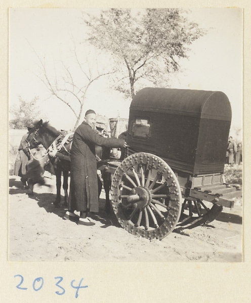 Man with horse and cart waiting to join wedding procession