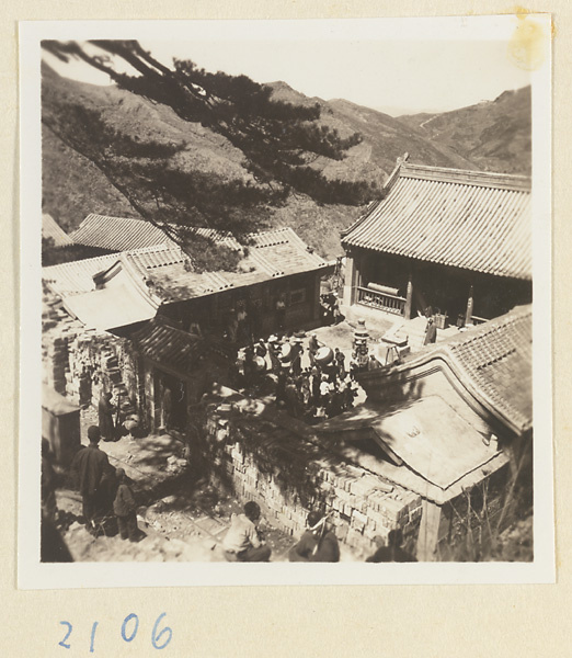 Drummers playing in a temple courtyard on the pilgrimmage route up Miaofeng Mountain