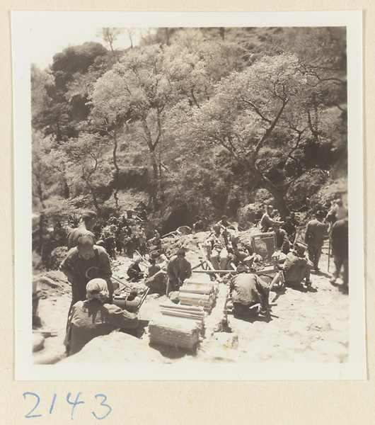 Pilgrims passing incense stands on Miaofeng Mountain