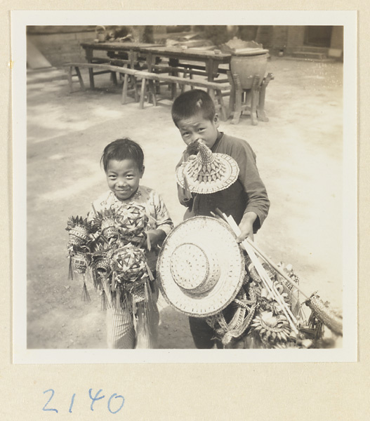 Children selling sourvenirs on the pilgrimage trail up Miaofeng Mountain