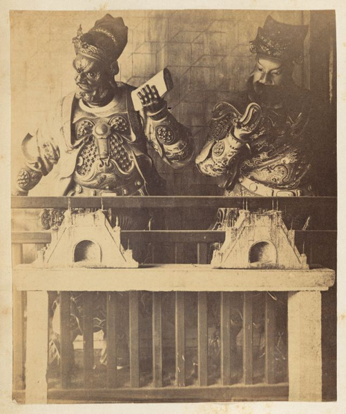 Figures at entrance to a temple