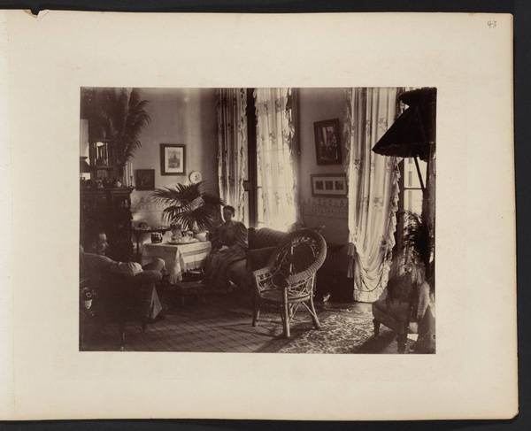 Young couple in sitting room of house in Canton