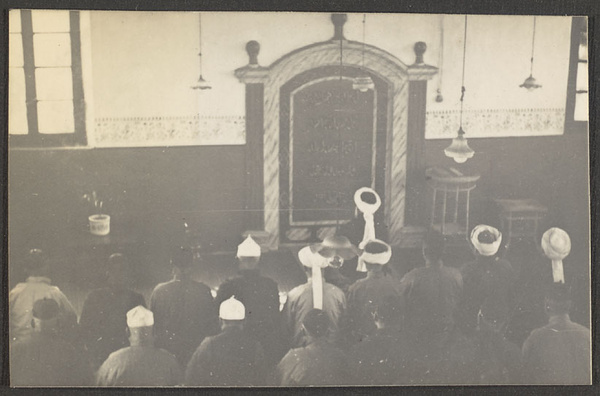 More of the prayer service. This is an actual service. Note the incense burning.