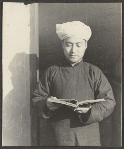 Hankow.  Reading the Koran.