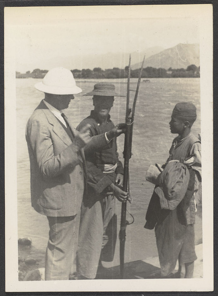 At the ferry. A Tibetan flintlock.