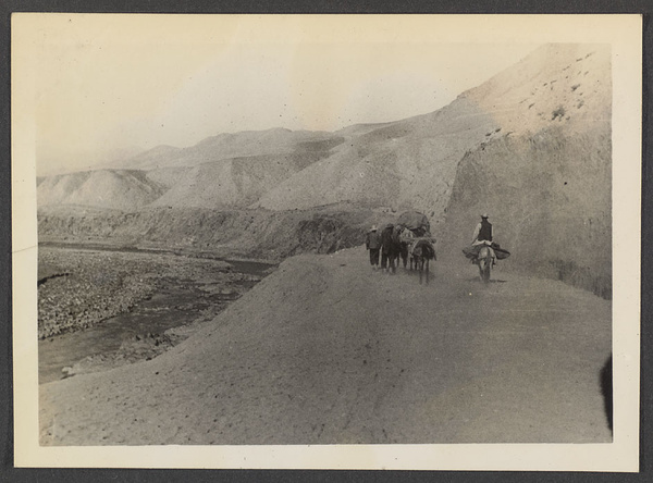 In the Great Hsia. A barren stretch of road along & above the Sining R.